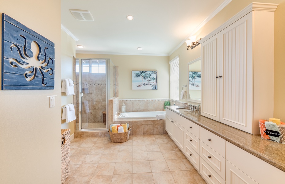 Spacious Ensuite Bath w/ Jacuzzi Tub, Dual Sinks, Large Glass Shower and Separate WC