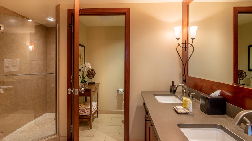 The spacious guest bathroom with a double vanity.