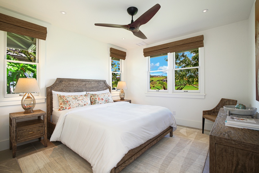 Guest bedroom 2 with king bed and garden views