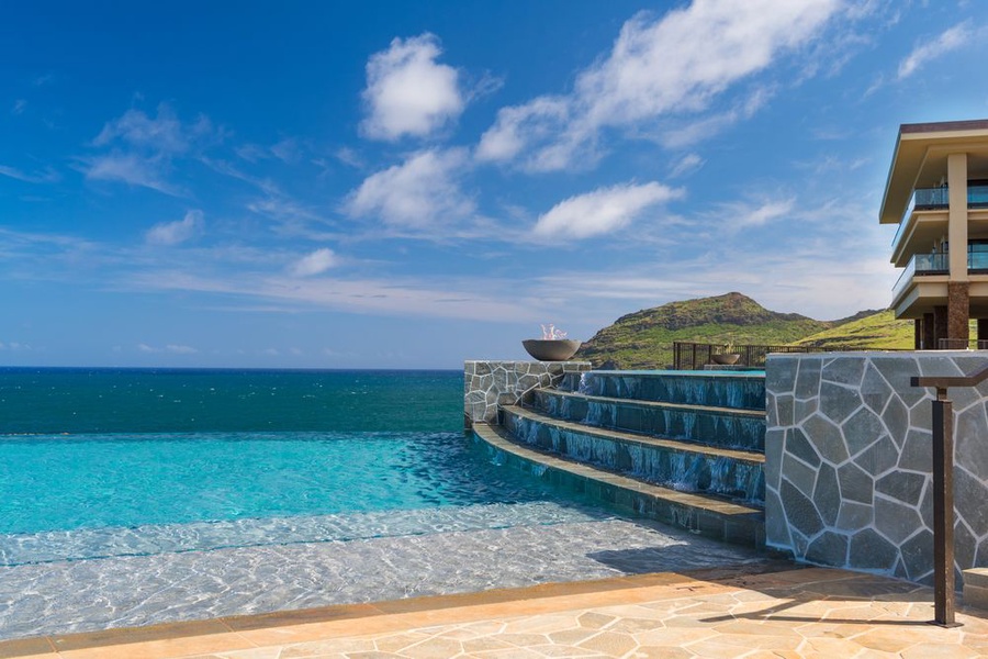 The two-tier, infinity-edge Kaiholo pool seems to flow right into the ocean.