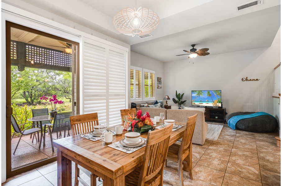 Adjacent to the kitchen is the dining area with a table fit for 4 and a bar countertop for entertainment while cooking