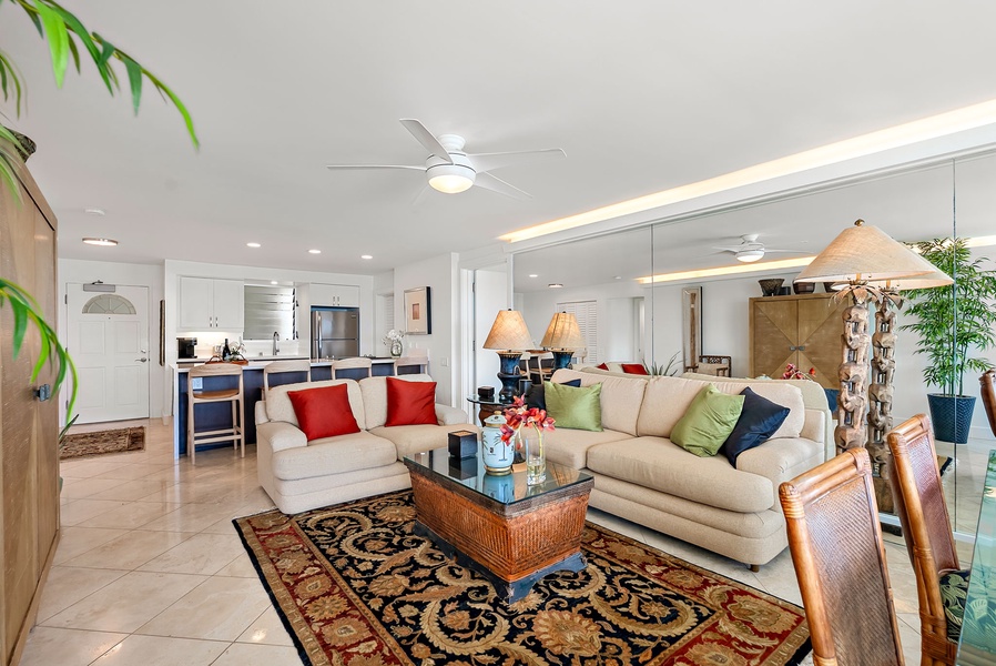 A seamless blend of style and comfort, this spacious living room offers a plush setting for board games, movie nights, or a midday siesta with the sound of the surf in the background.