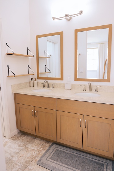 Double vanity in the ensuite bath makes mornings effortless for couples or families.