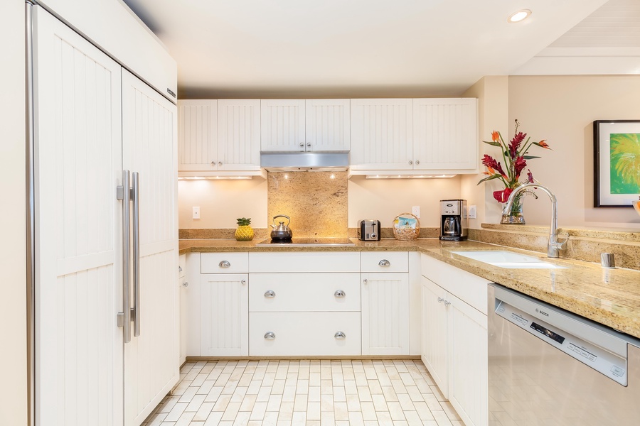 Large kitchen with stainless steel appliances