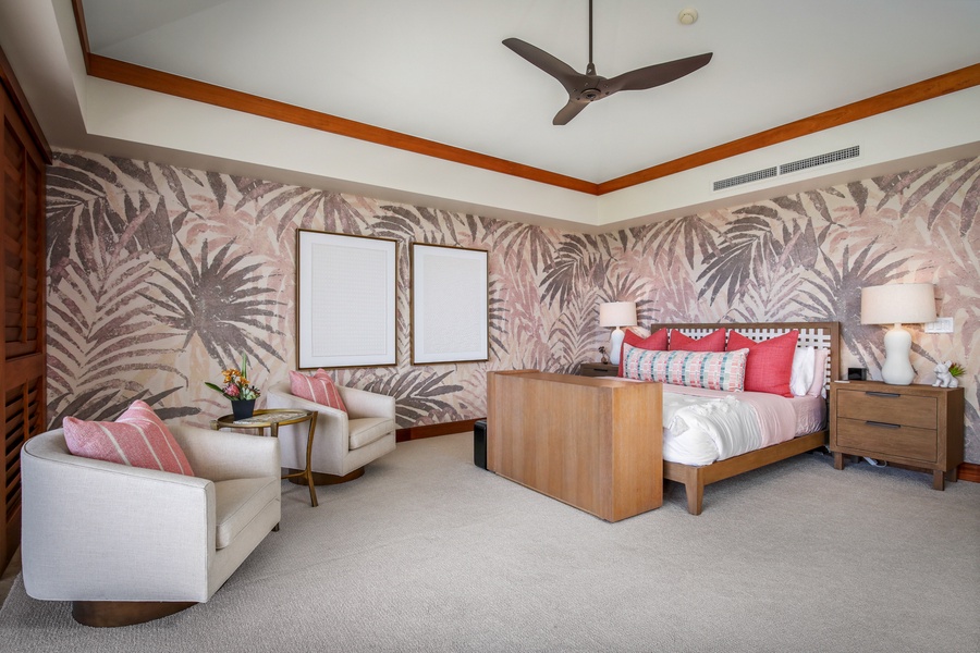 Primary bedroom suite with king bed, private lanai, ocean views and en suite bath.