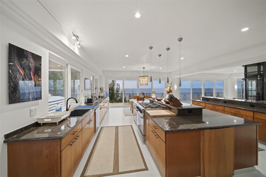 The spacious kitchen area features stainless steel appliances.