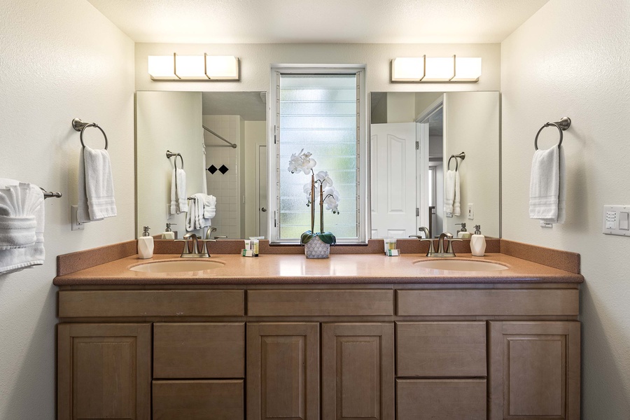 Shared jack & Jill bath with dual vanities