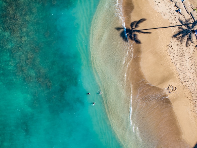 Aerial view of the beach near Royal Kahana 1010, with crystal-clear Maui waters.