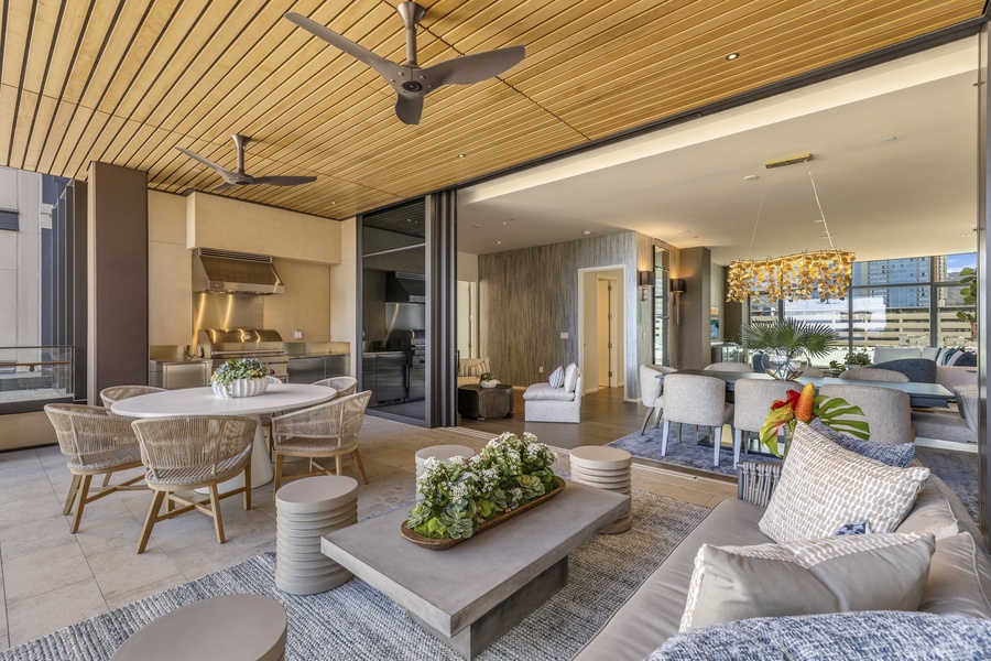 The open and spacious balcony opens to the formal indoor dining area