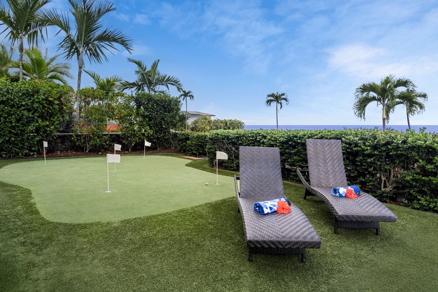 Backyard putting green with ocean breeze—perfect for fun family moments or quiet afternoon play.