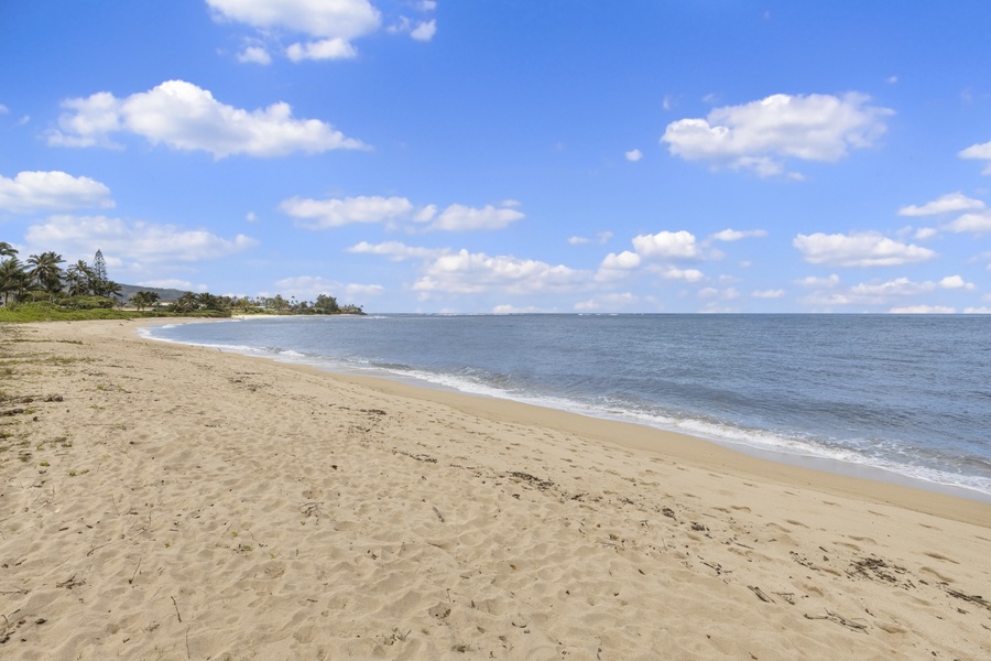 Sandy beach in front of the home reachable by foot