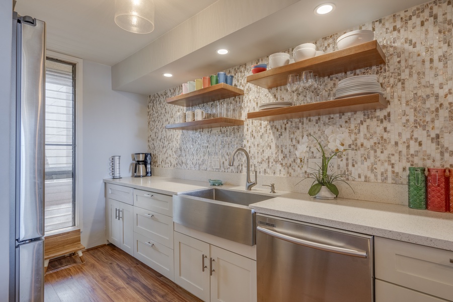 The kitchen has ample counter spaces, top-tier appliances, and a coffee corner setup. (Note: Coffee is not provided so feel free to bring your own.)