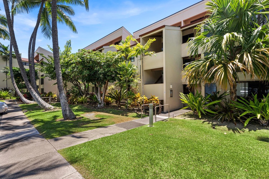 Serene condo oasis nestled amidst lush tropical greenery – your private escape in paradise.