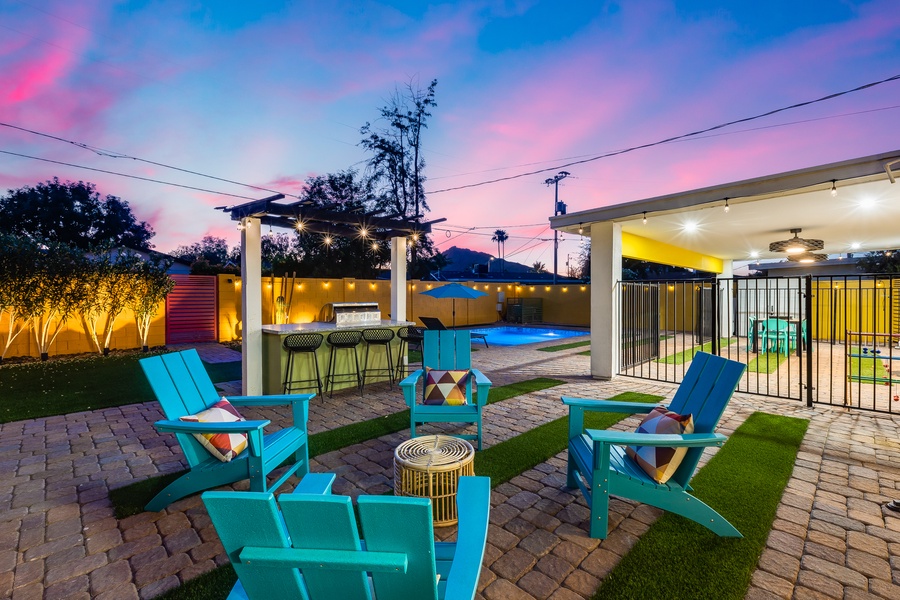 An outdoor patio and festive lights invites you to Gather around your loved ones!