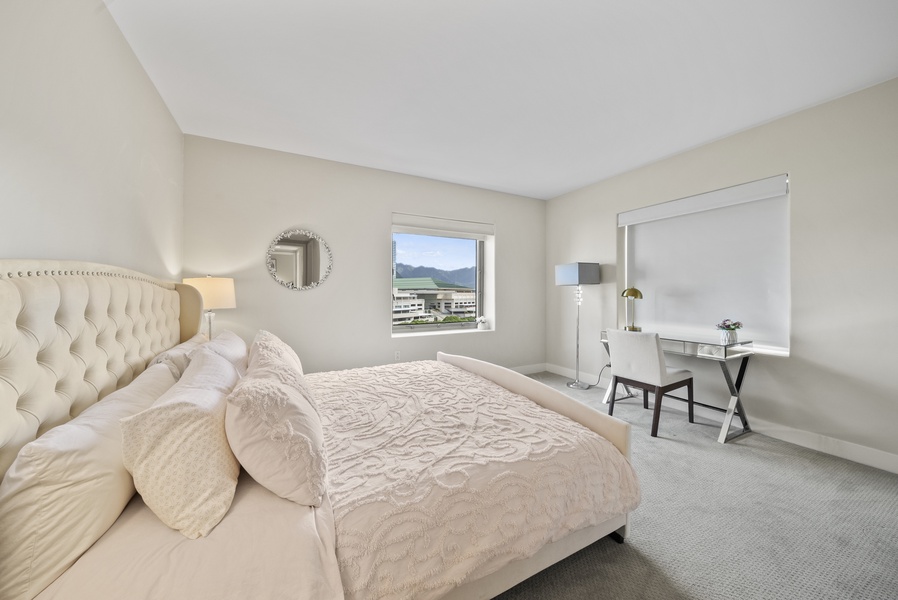 The primary bedroom has views and natural light.