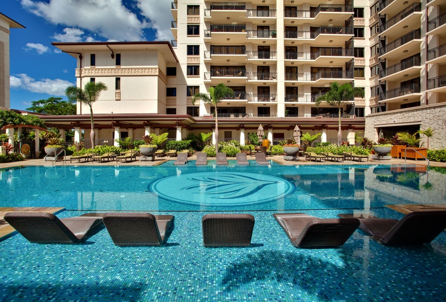 Refresh and unwind: our pool flanked by chaise lounges beckons after your day's adventures.
