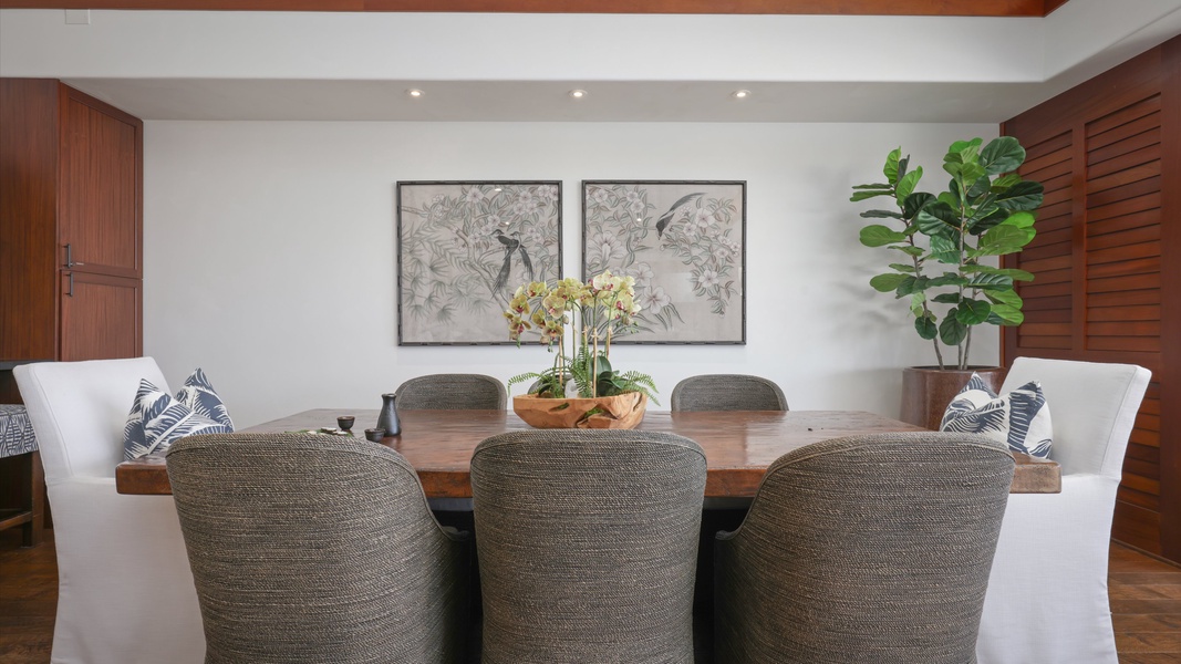 Savor your meals in the dining area with table for eight.