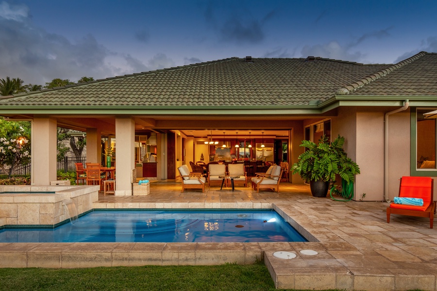 Evenings come alive as the villa glows beside the tranquil pool — the perfect setting to unwind in style.