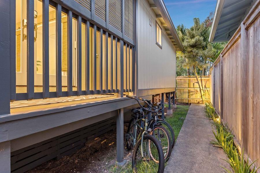Stroll past the side yard and bike storage on your way to a surf-filled day at Velzyland Beach.