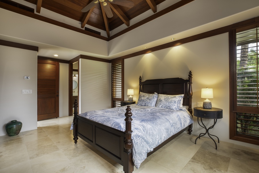 Drift off beneath soaring wood beams and gentle tropical breezes in your elegant island suite.
