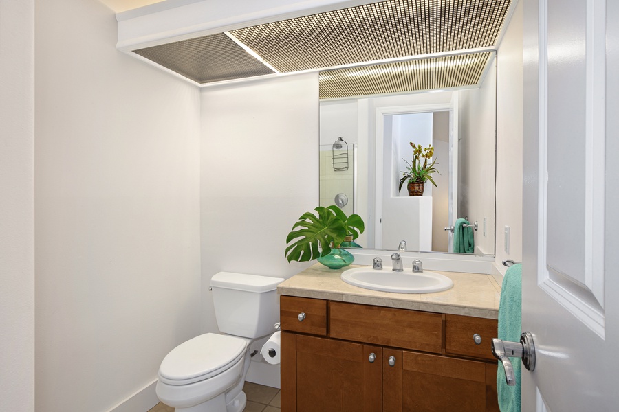 Guest suite three ensuite has a vanity and walk-in shower for a refreshing start to your day.
