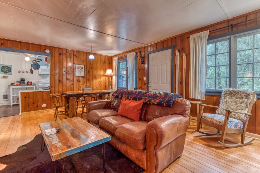Step back in time as you enter the cabin into the open-concept common area.