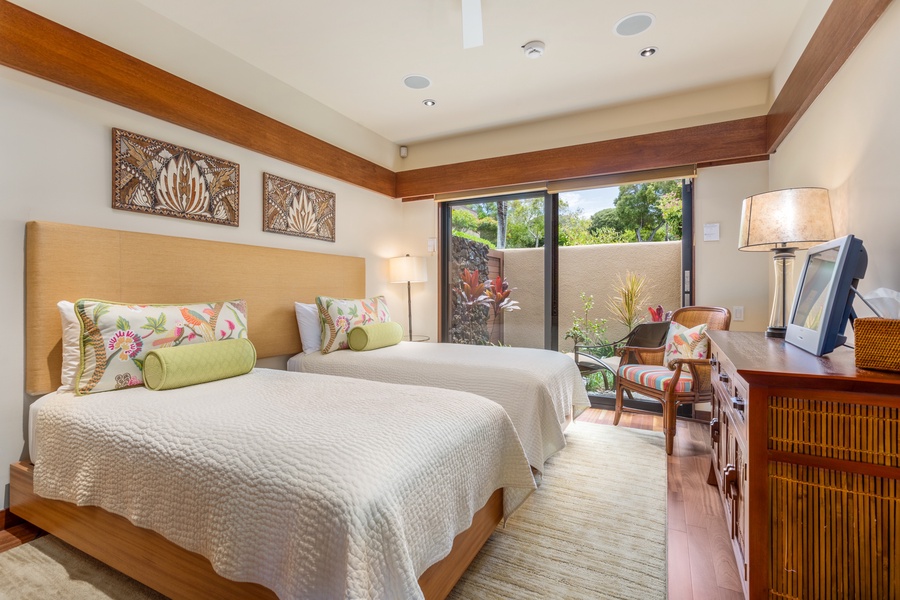 Second Bedroom w/Two Twin Beds (can convert to King upon request), Flat Screen TV & Sliding Doors to Private Courtyard.