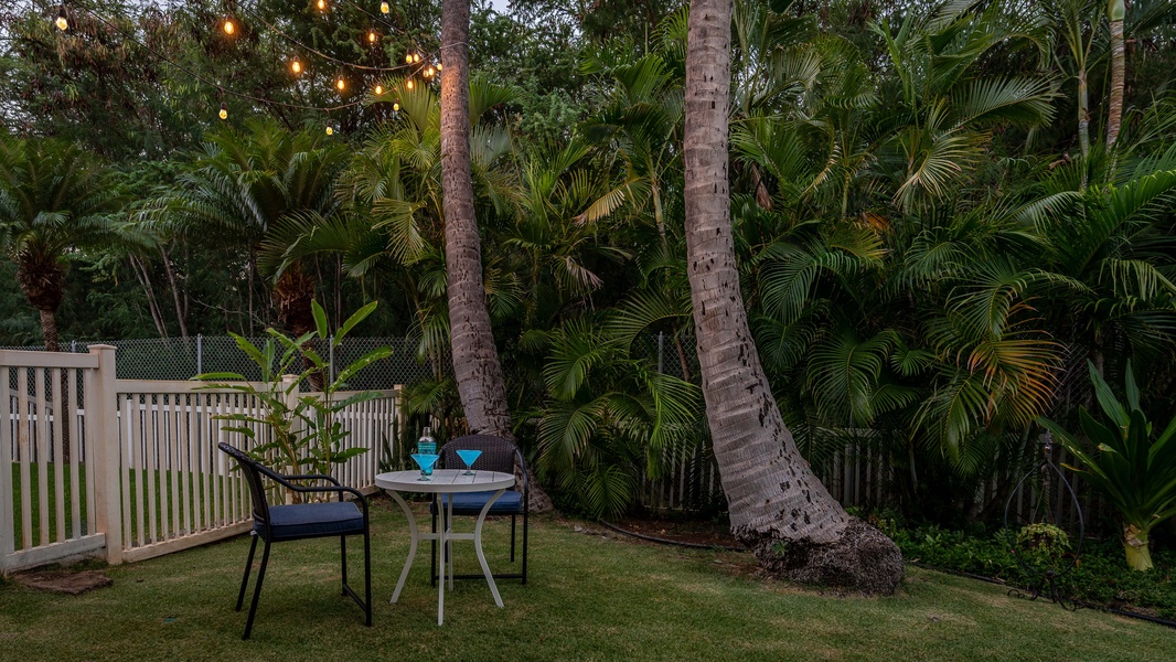 The tranquil backyard where you can dine al fresco under swaying palm trees.