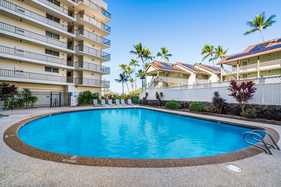 Kona Alii's pool with poolside loungers.