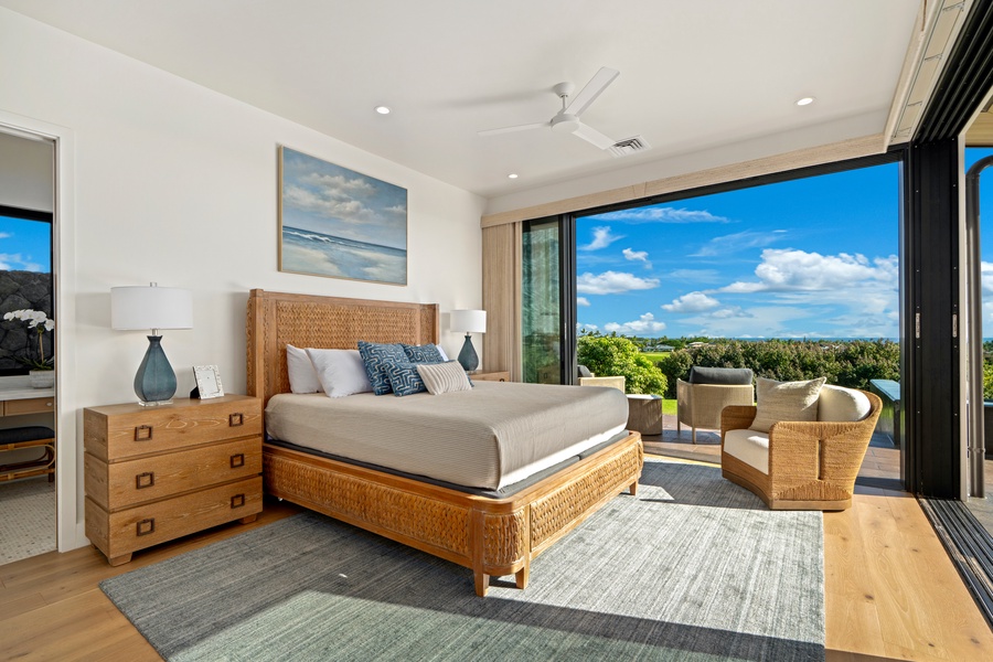 Wake up to stunning panoramic views from your peaceful bedroom sanctuary, where floor-to-ceiling windows frame endless blue skies and lush landscapes.