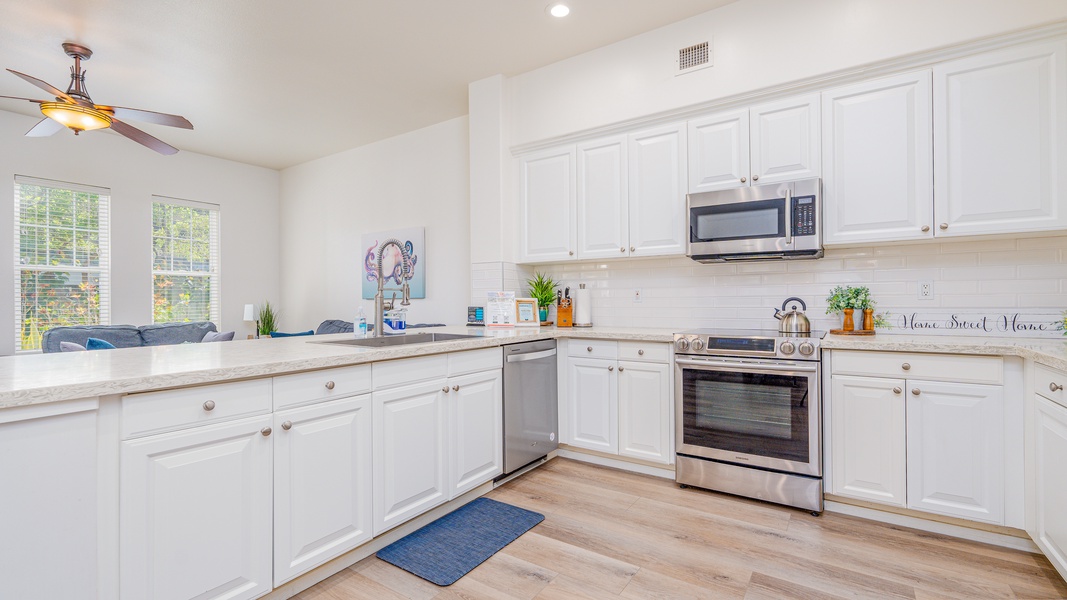 The spacious kitchen has all your needs for a relaxing vacation.