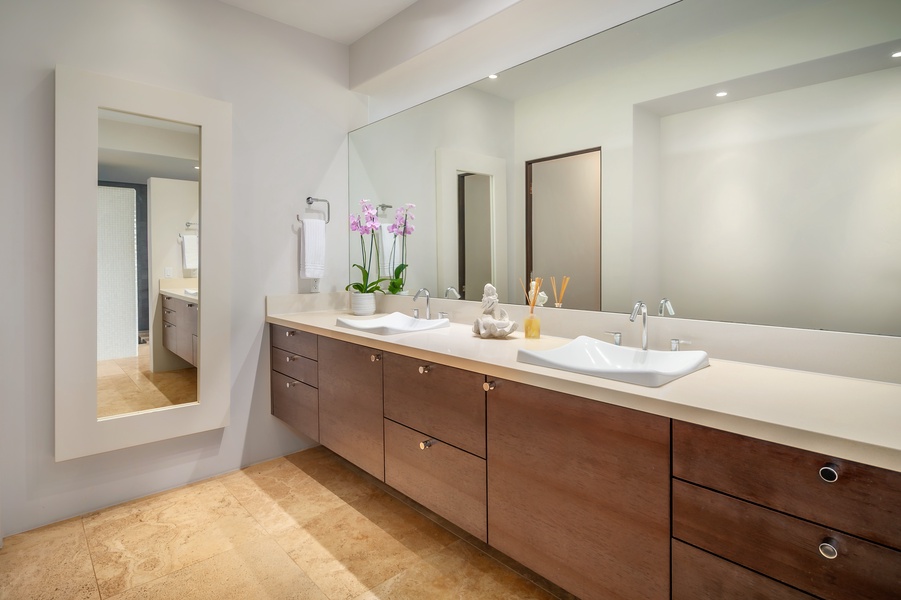 Elegant bathroom with double vanity sinks, offering ample space and convenience.