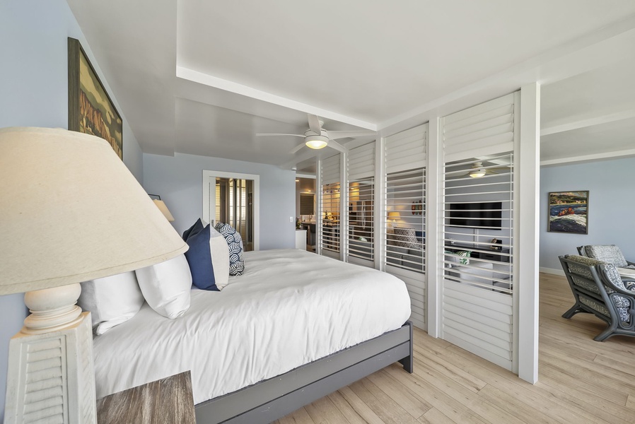 Your elegant bedroom features crisp linens and modern coastal style.