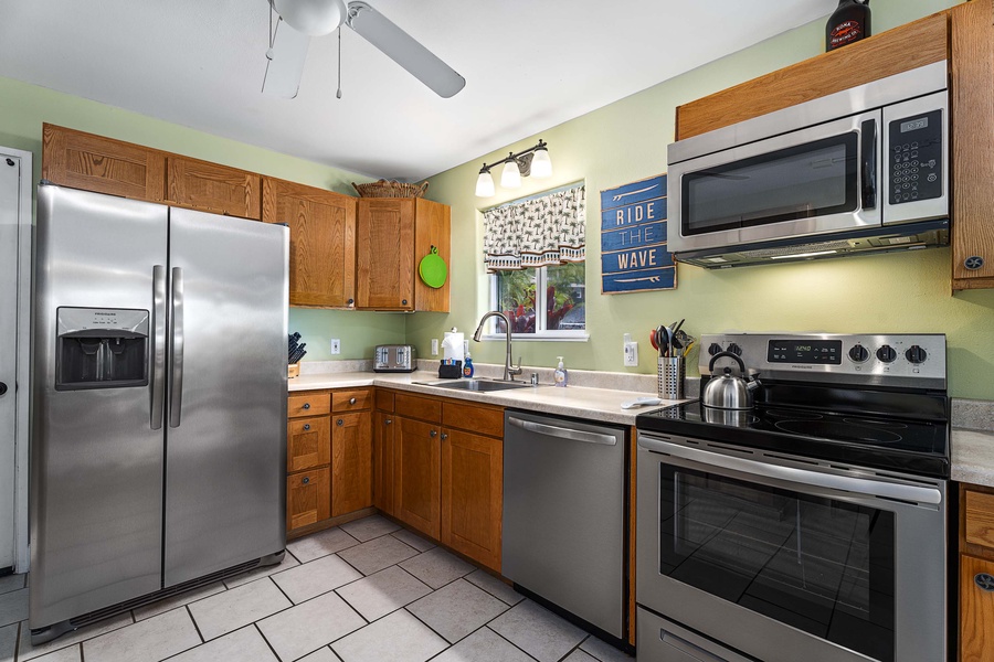 Stainless appliances throughout the fully equipped kitchen
