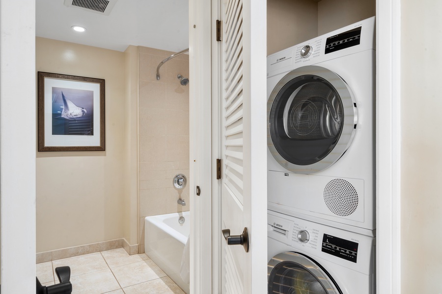 Honua Kai Konea 230/232 includes in-unit laundry with a stacked washer and dryer for added convenience