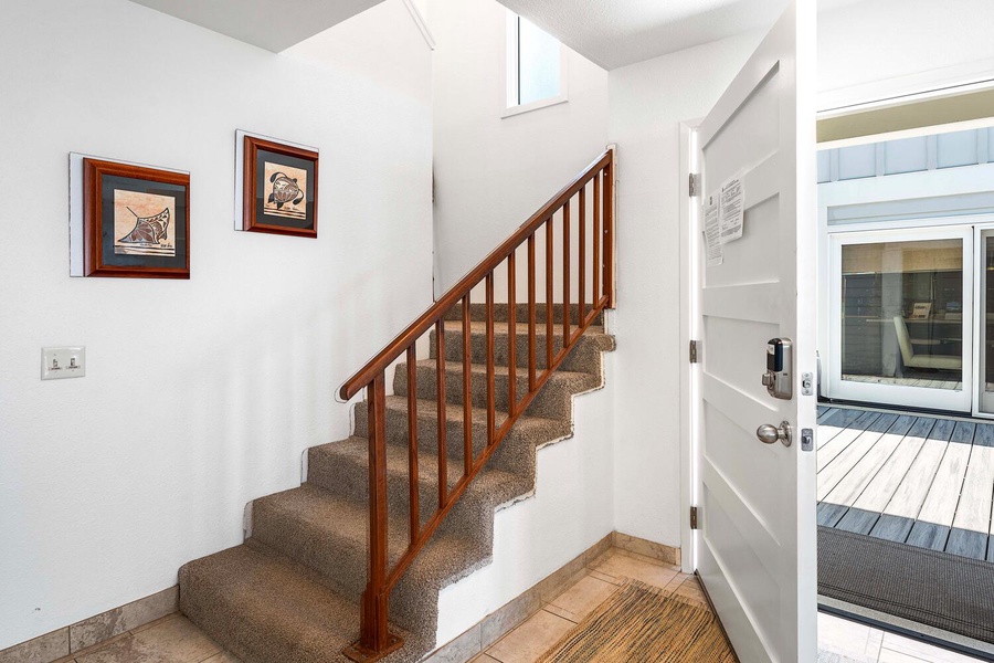 The entry way and stairs to upper level.