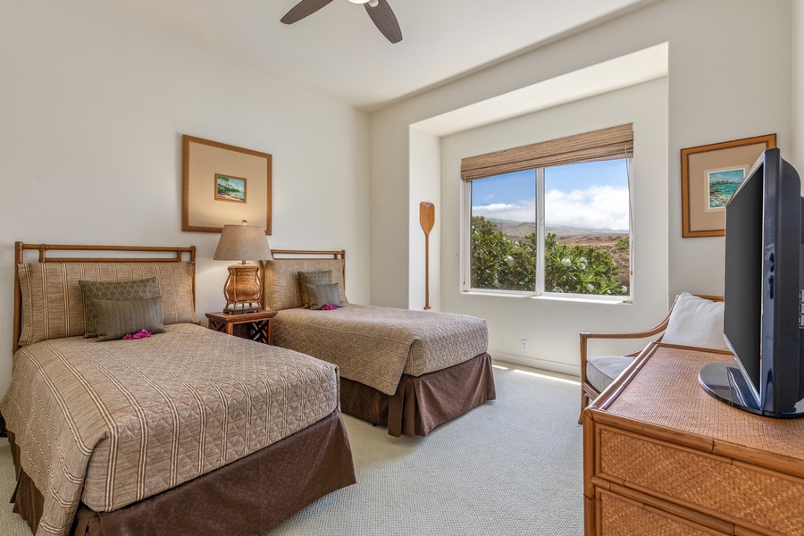 Guest room with two twin beds (can convert to a king upon request) and
mountain views.