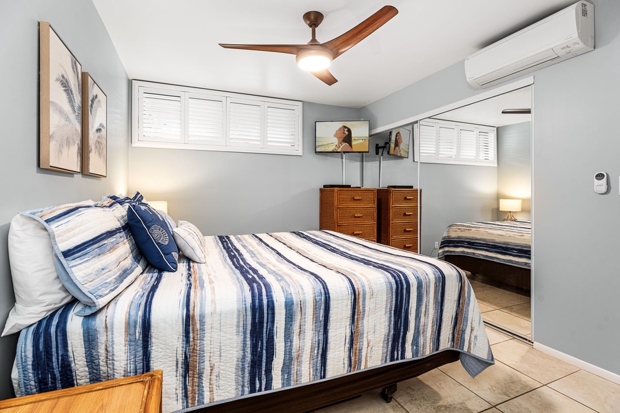 Wake up to soft coastal light in the spacious primary suite with upgraded comfort.