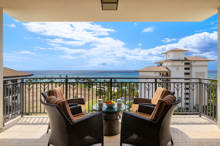 Beautiful lanai with patio seating and table, and perfect Pacific views.