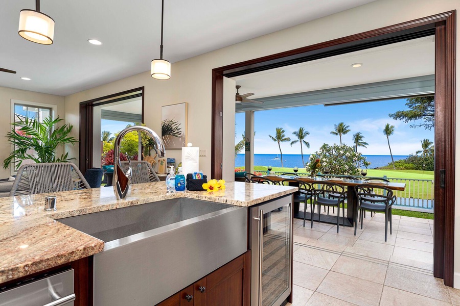 Kitchen with a seamless transition to an oceanfront patio, perfect for entertaining.