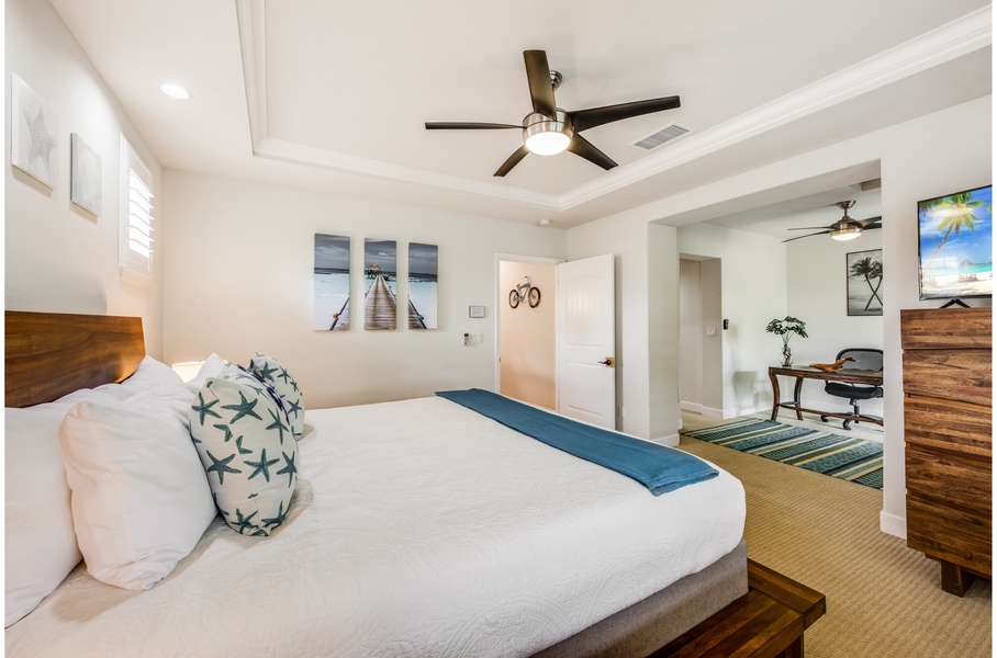 The Primary bedroom also has a work space with desk and chair
