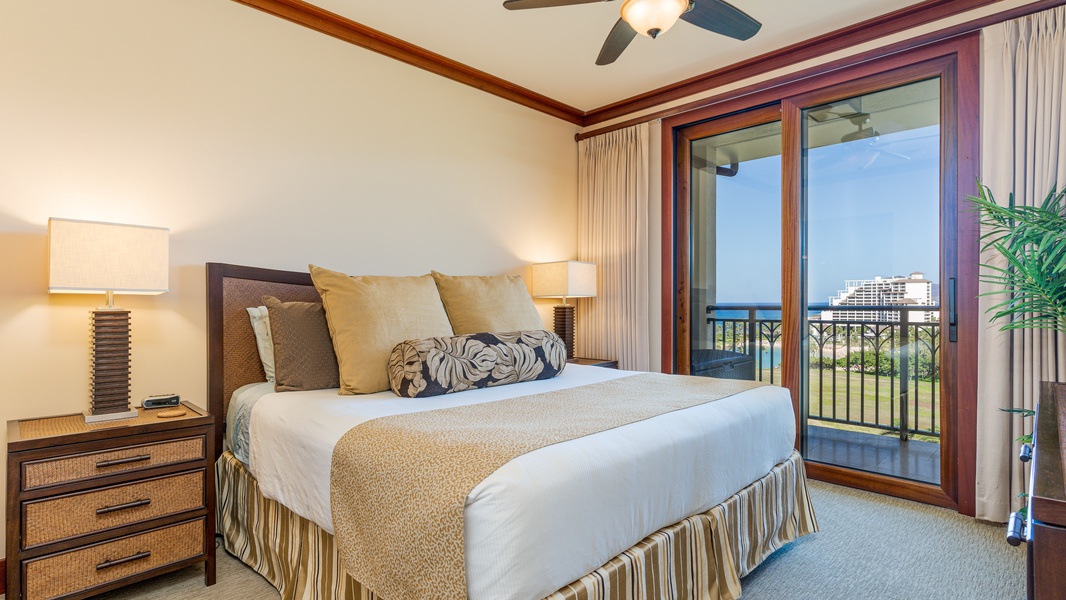 The primary guest bedroom with a king bed and incredible views.