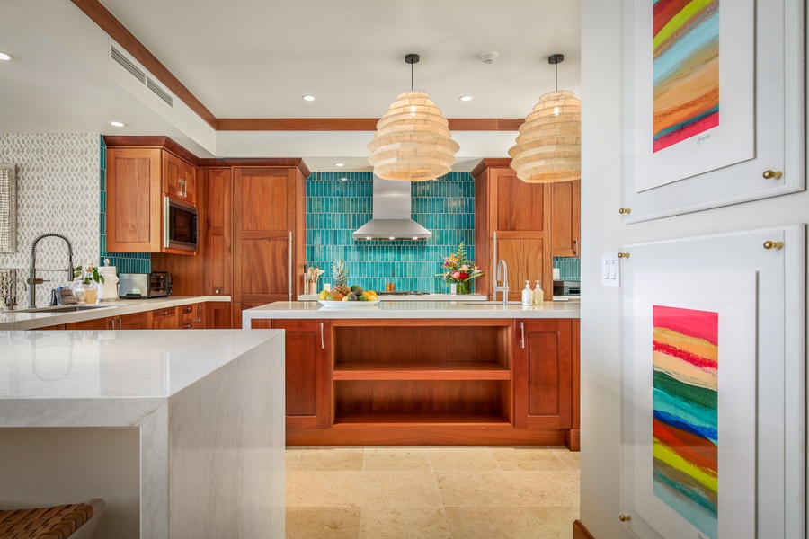 Dual ocean view sinks and ample counter prep space - a chef’s (or enthusiast’s) dream!