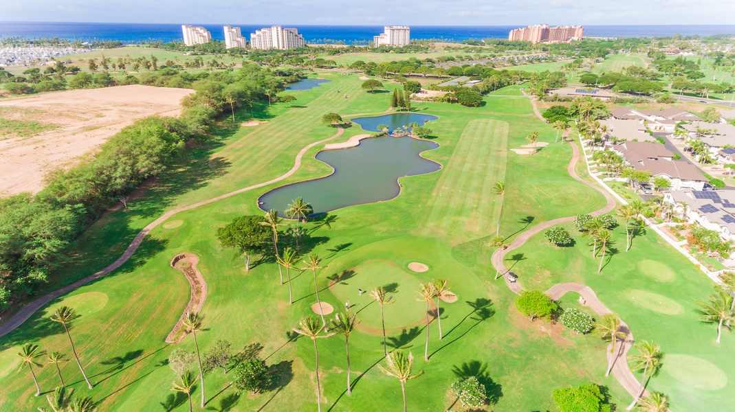 An aerial view of the lush green golf course.
