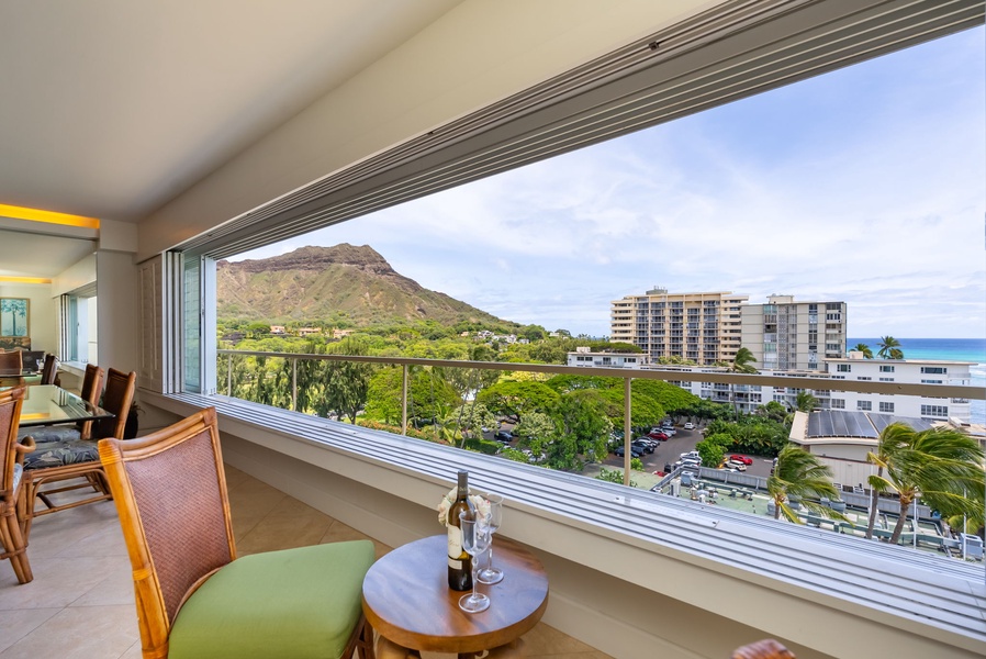 A cozy in-room table by the window sets the stage for relaxing mornings or wine-filled evenings.
