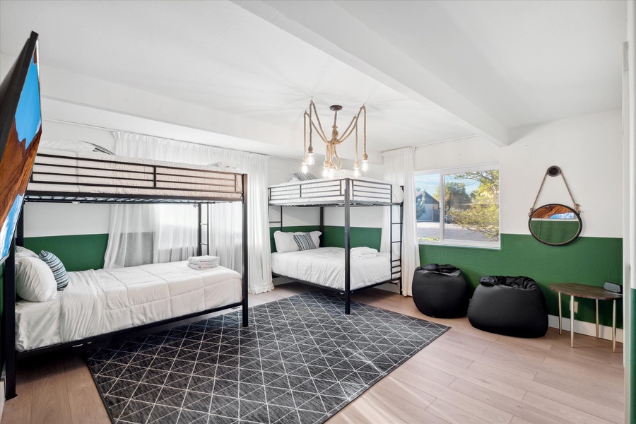 Spacious fifth bedroom with two bunk beds perfect for the kids.