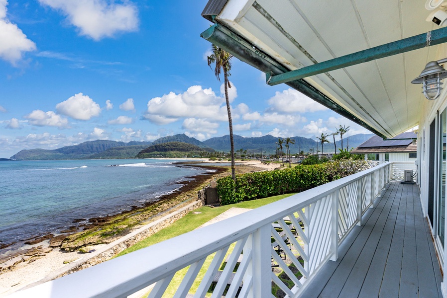 Step onto your oceanfront balcony where gentle trade winds carry the sound of waves and sweeping views stretch across pristine coastline.