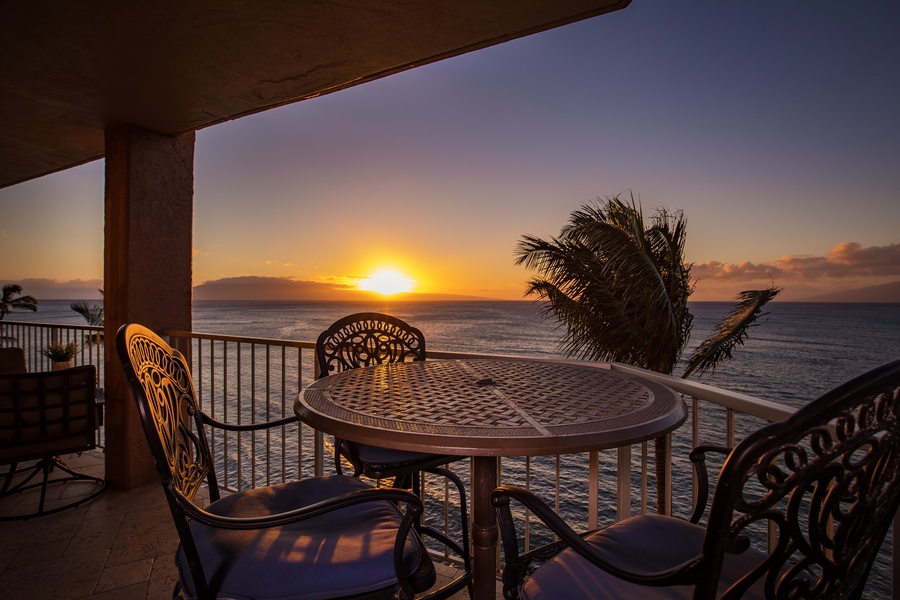 Watch the sunset from Royal Kahana 610's lanai, the perfect spot to unwind and enjoy the stunning ocean views.