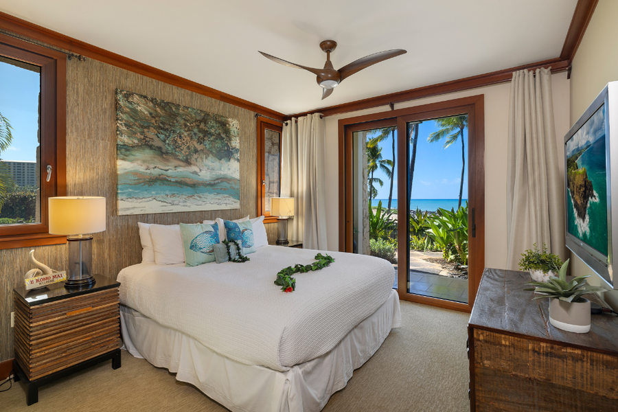 Enjoy sunset views from the private primary suite with fan and flat screen tv.