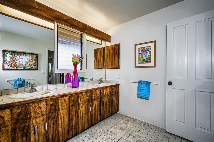 Primary bathroom with dual vanities